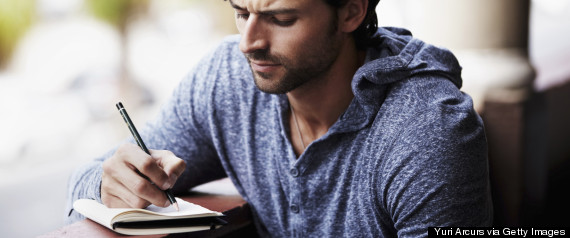 man with journal