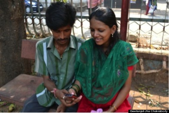 a young couple listening to mmitra call