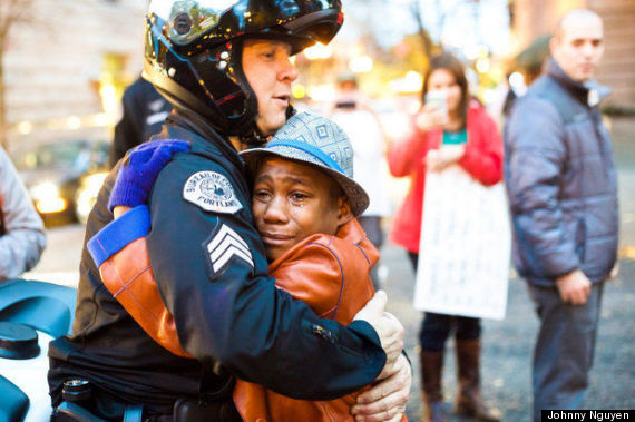 12 year old devonte hart hugs a police officer