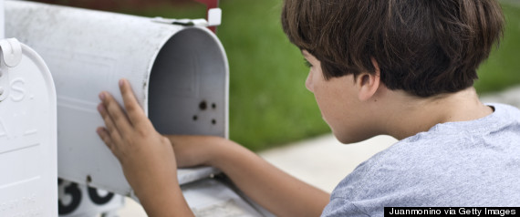 kid checking mail