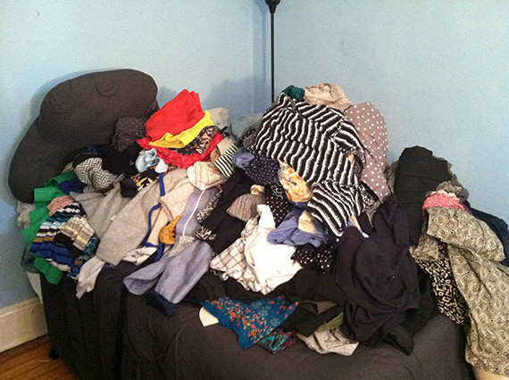 bed clothes pile