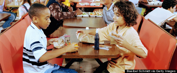 kid eating school lunch
