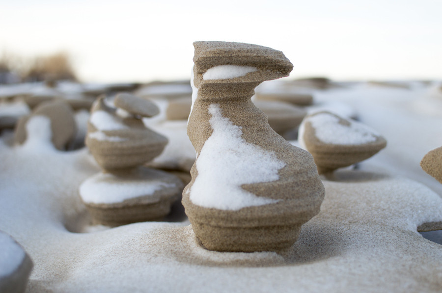 What's creating bizarre sand sculptures along Lake Michigan?