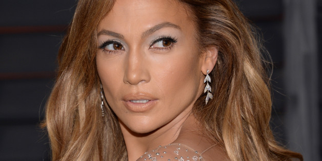 Jennifer Lopez Stuns In See-Through Gown At Vanity Fair Oscar Party