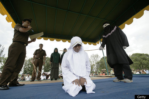 Irdavanti Mukhtar Indonesian Woman Caned In Public For Adultery