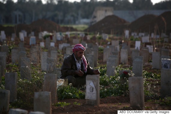 syrian man grave son
