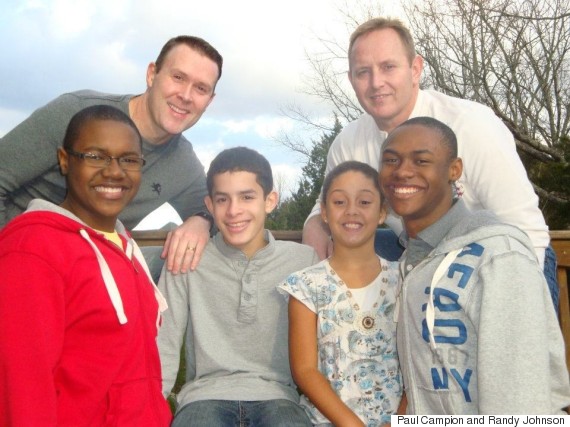 Paul Campion and Randy Johnson with their four children, 2011.