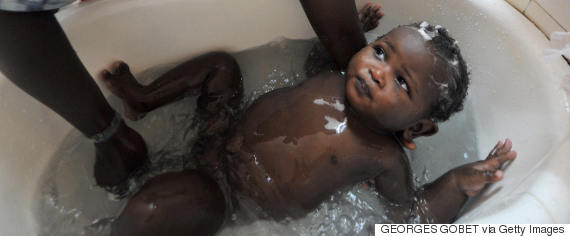 washing baby africa