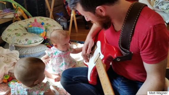 dad playing guitar twins