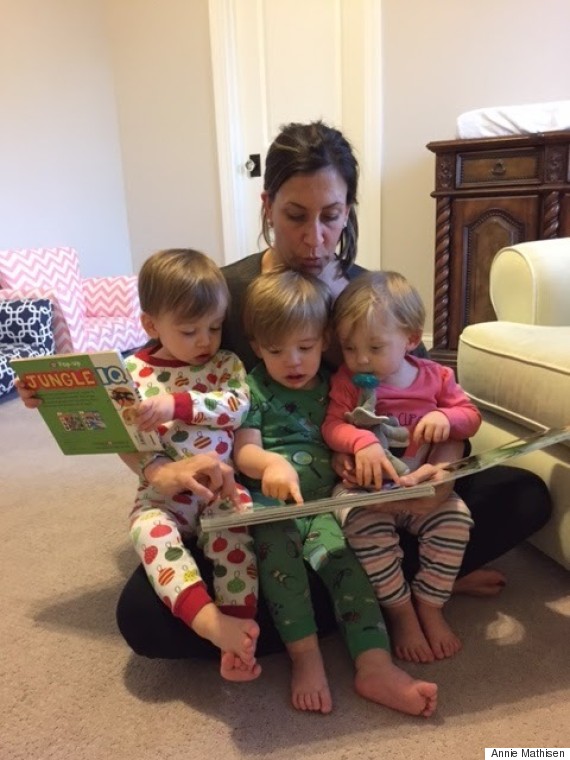 mom reading to triplets