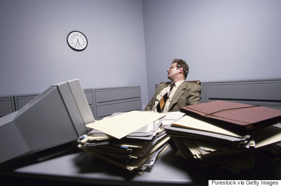 tired person glance at clock