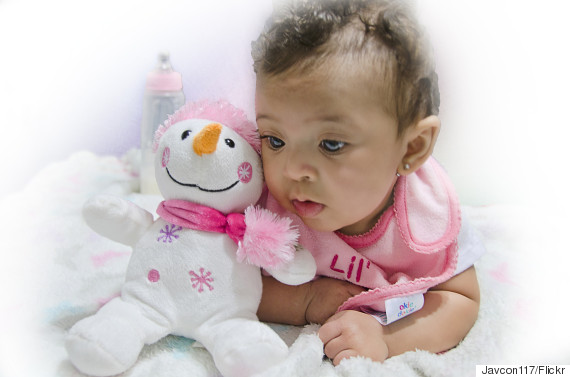 baby with snowman