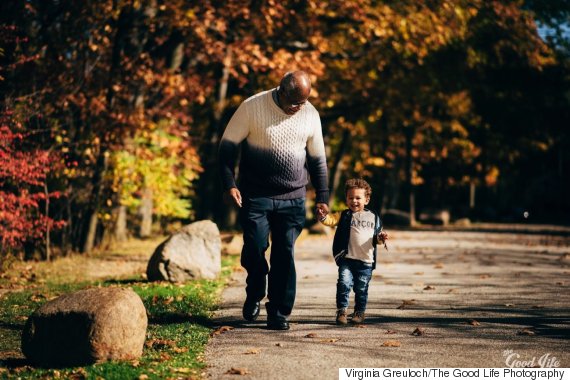 grandfather walking with grandchild