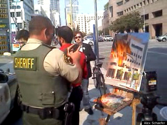 Accidental Political Artist Paints Burning Banks PHOTOS