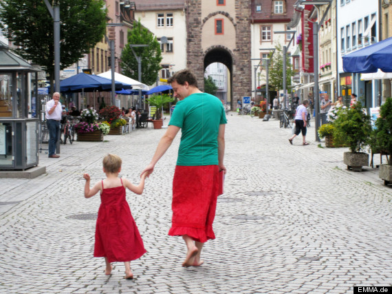 dad wears skirt with son